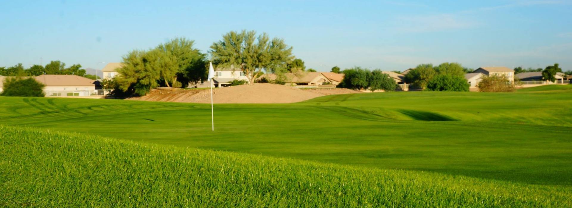 View of golf course with flag